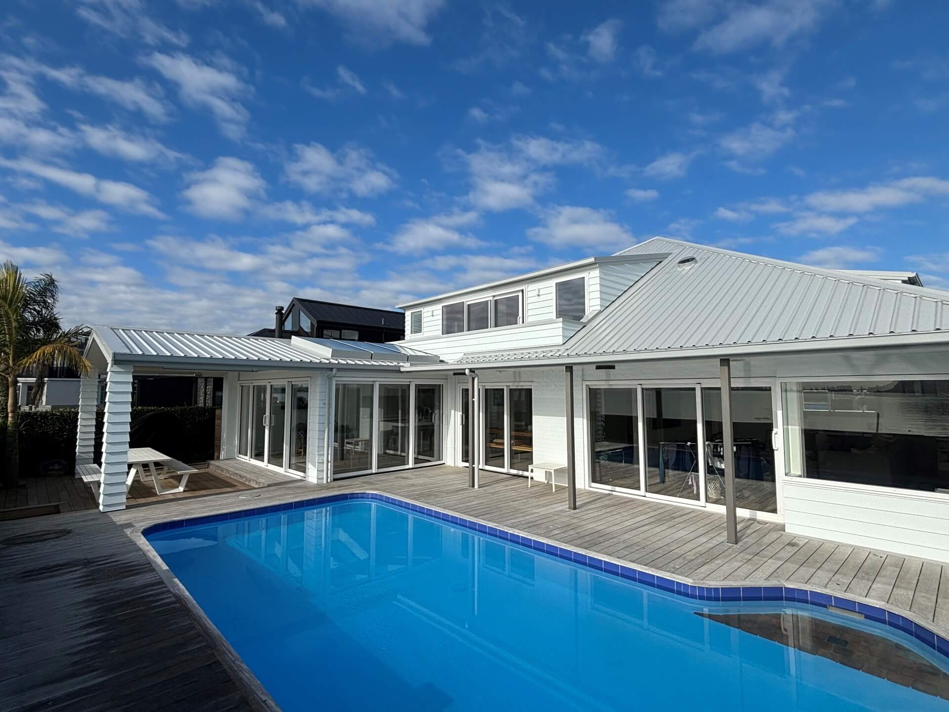 Kulim Avenue extension with Cedar re-clad, new roof, new windows and extensive interior upgrade